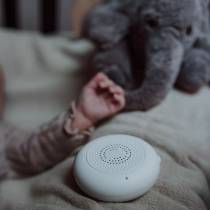 Boîtier rechargeable de la peluche musicale George lÉléphant avec sons apaisants pour lendormissement