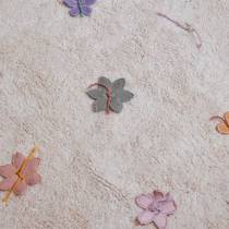 Nouez les fleurs colorées en tissu sur votre tapis wildflowers