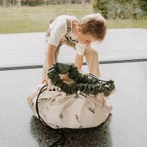 Enfant ferme le sac de rangement Play and Go Croco